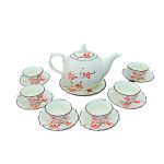 Bộ trà vẽ tay men kem/men xanh mẫu đơn