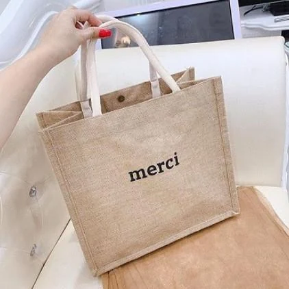 Túi dệt thô in merci có quai ngắn và nút ở miệng