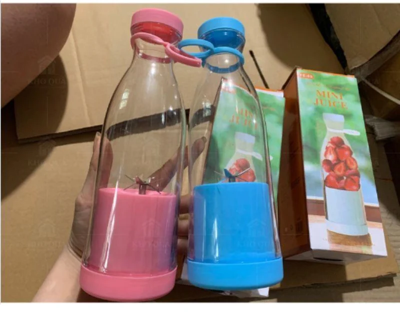 Hai máy xay mini màu hồng xanh cùng hộp ngoài